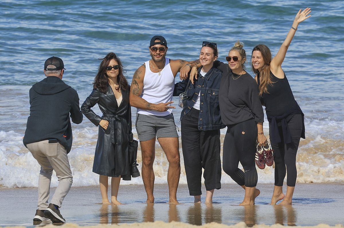 After landing at Sydney Airport earlier in the day, the Hollywood actress made a beeline for Bondi Beach, spotted frolicking on the sand with a group of mates.