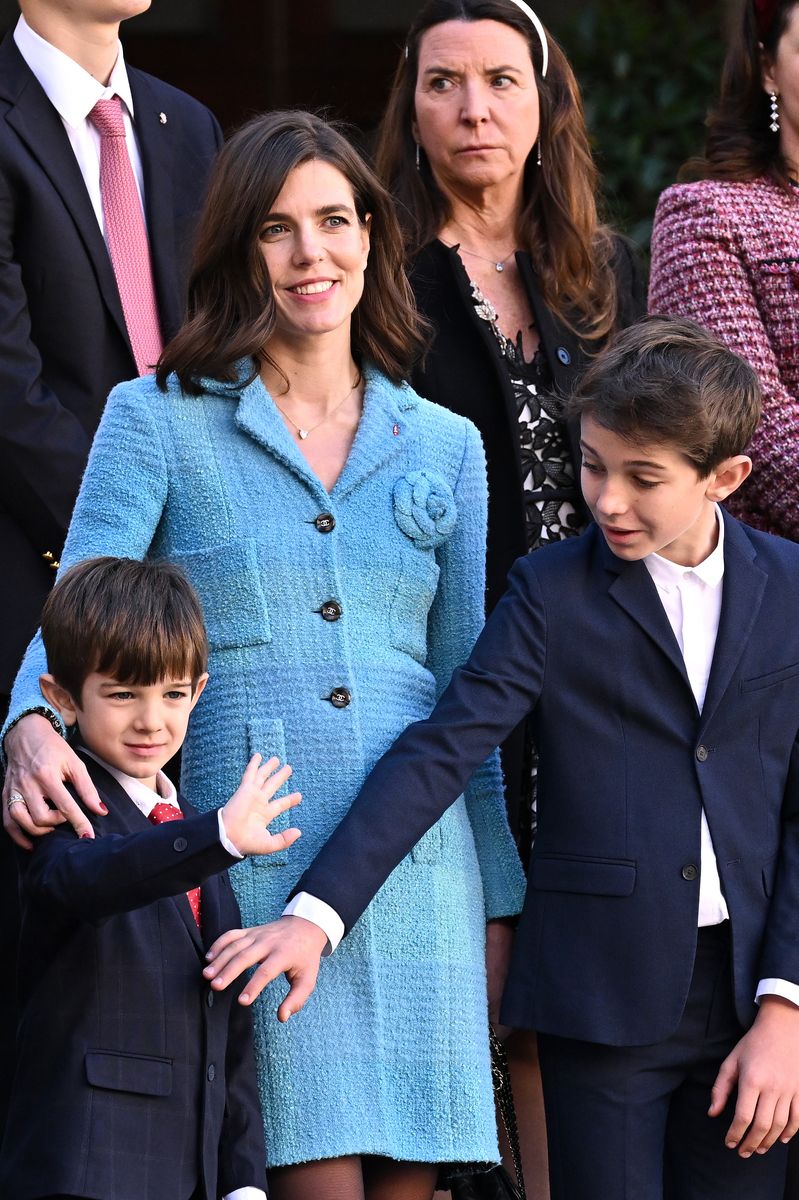 MONACO, MONACO - NOVEMBER 19: (EDITOR'S NOTE : NO TABLOIDS WEB & PRINT, NO DAILY MAIL, NO DAILY MAIL GROUP, NO BILD, NO CHI, NO VOICI, NO CLOSER) Balthazar Casiraghi-Rassam, Charlotte Casiraghi and Raphael Elmaleh attend the Monaco National Day celebrations in the courtyard of the Monaco palace on November 19, 2024 in Monaco, Monaco. (Photo by Stephane Cardinale/PLS Pool/Getty Images)