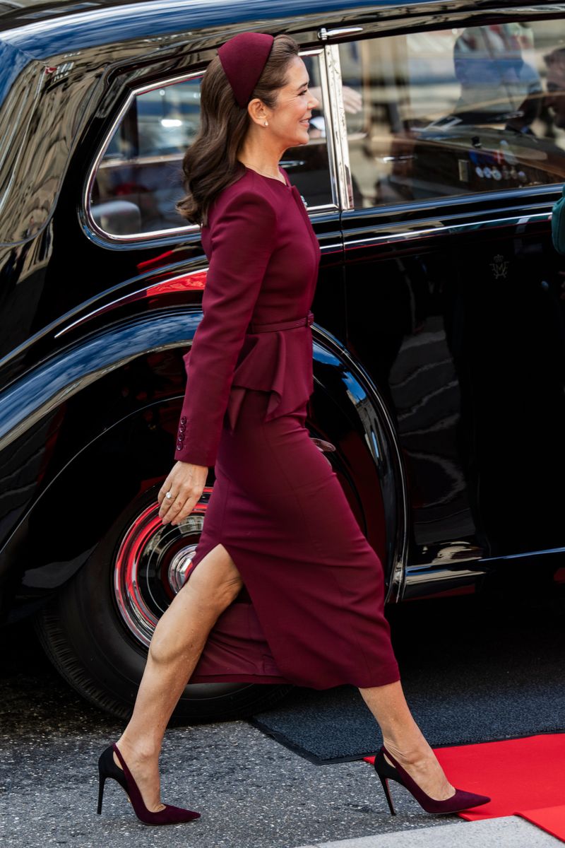 Queen Mary embraced rich burgundy tones for the opening of Denmark’s Parliament at Christiansborg Palace.
