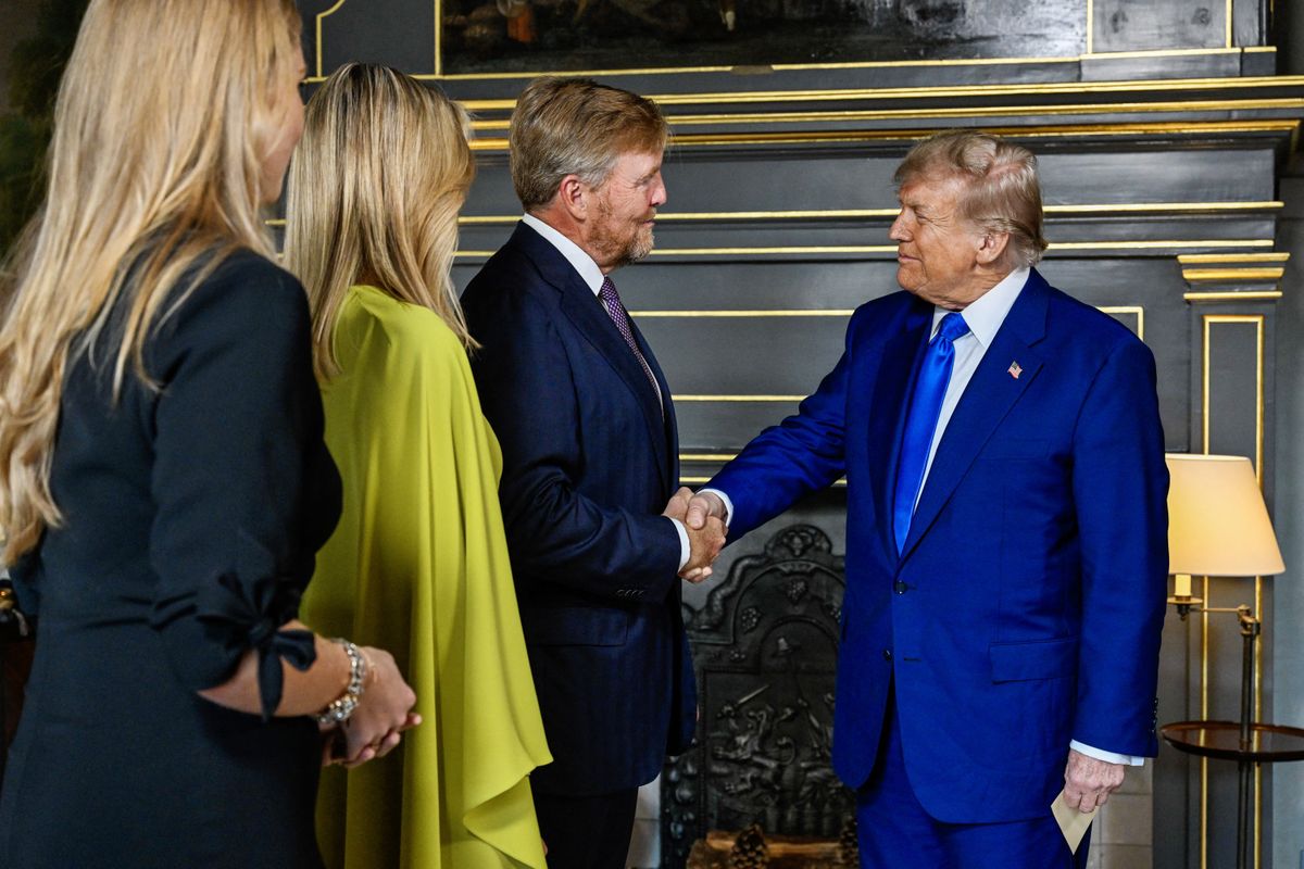 King Willem-Alexander (2nd R) and Queen Maxima (2nd L) of the Netherlands, along with Crown Princess Amalia (L), greet US President Donald Trump (R) prior to a social dinner with NATO country leaders at the 'Huis ten Bosch' Royal Palace, during a North Atlantic Treaty Organization (NATO) Heads of State and Government summit in The Hague, on June 24, 2025. NATO leaders hold a two-day summit on June 24 and 25 in The Hague. (Photo by Mischa Schoemaker / POOL / AFP) (Photo by MISCHA SCHOEMAKER/POOL/AFP via Getty Images)          