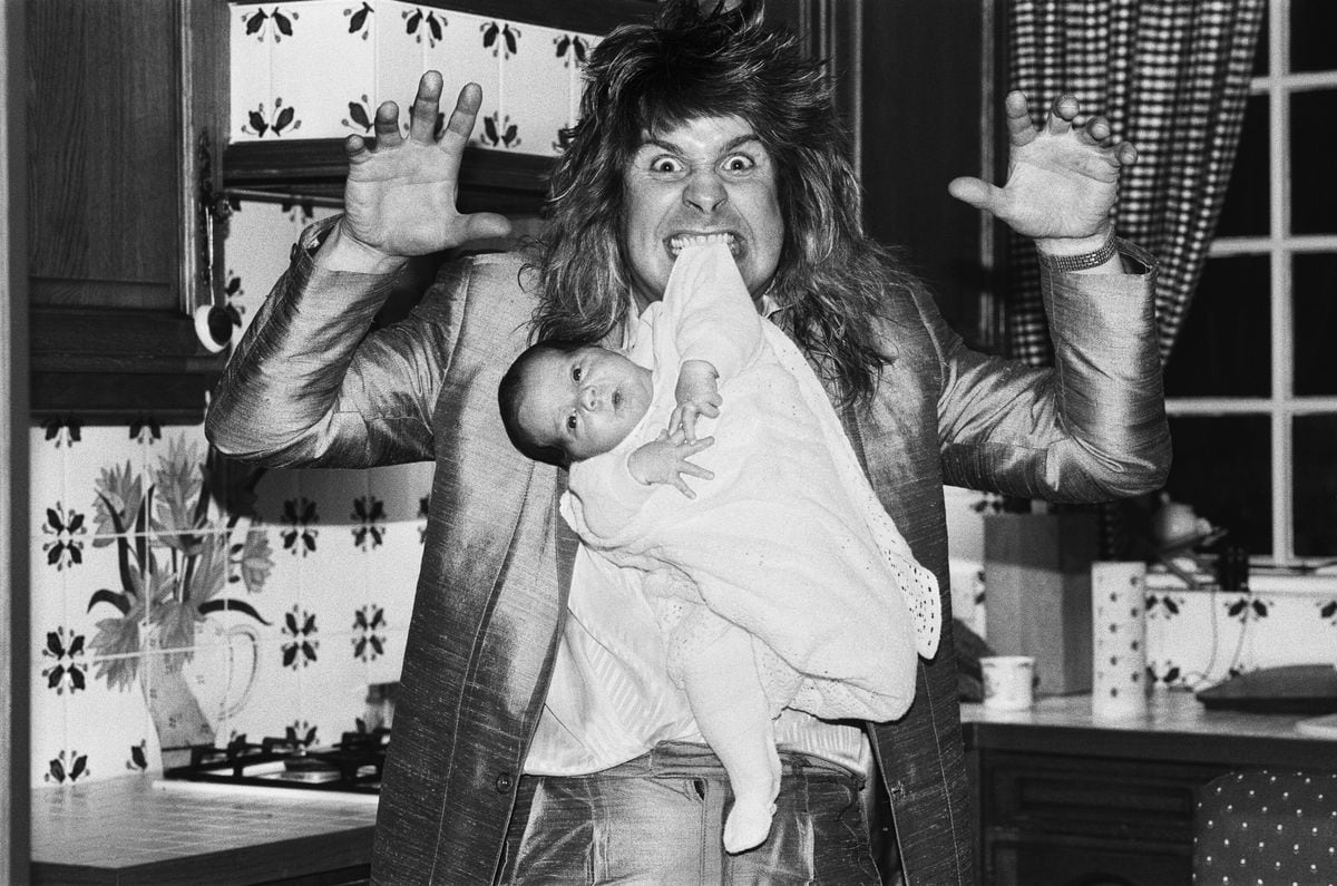 Ozzy Osbourne pictured at home two weeks after the birth of his baby boy Jack 25th November 1985. 