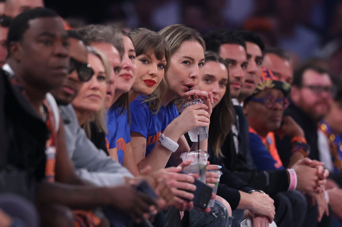Taylor Swift and Este Haim attend Game Four of the 2026 NBA Finals between the San Antonio Spurs and the New York Knicks.