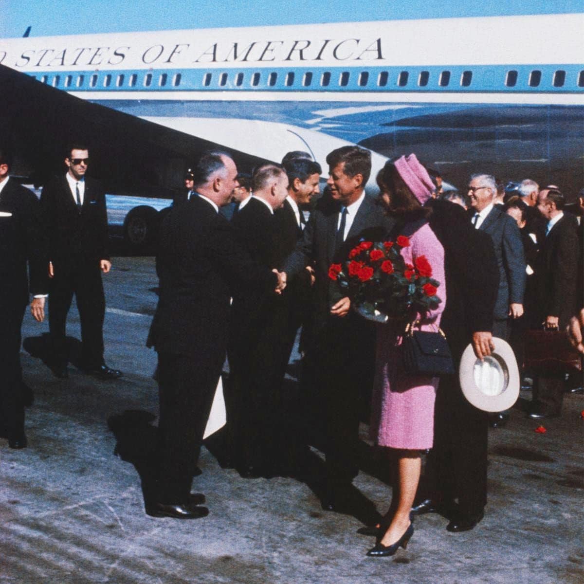 Jackie and John F Kennedy Arriving at Airport