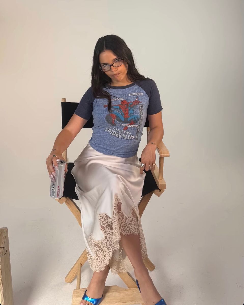 Inde Navarrette showcased her signature blend of gamer-girl nostalgia and effortless style in a vintage-inspired Spider-Man tee paired with a lace-trim satin skirt.