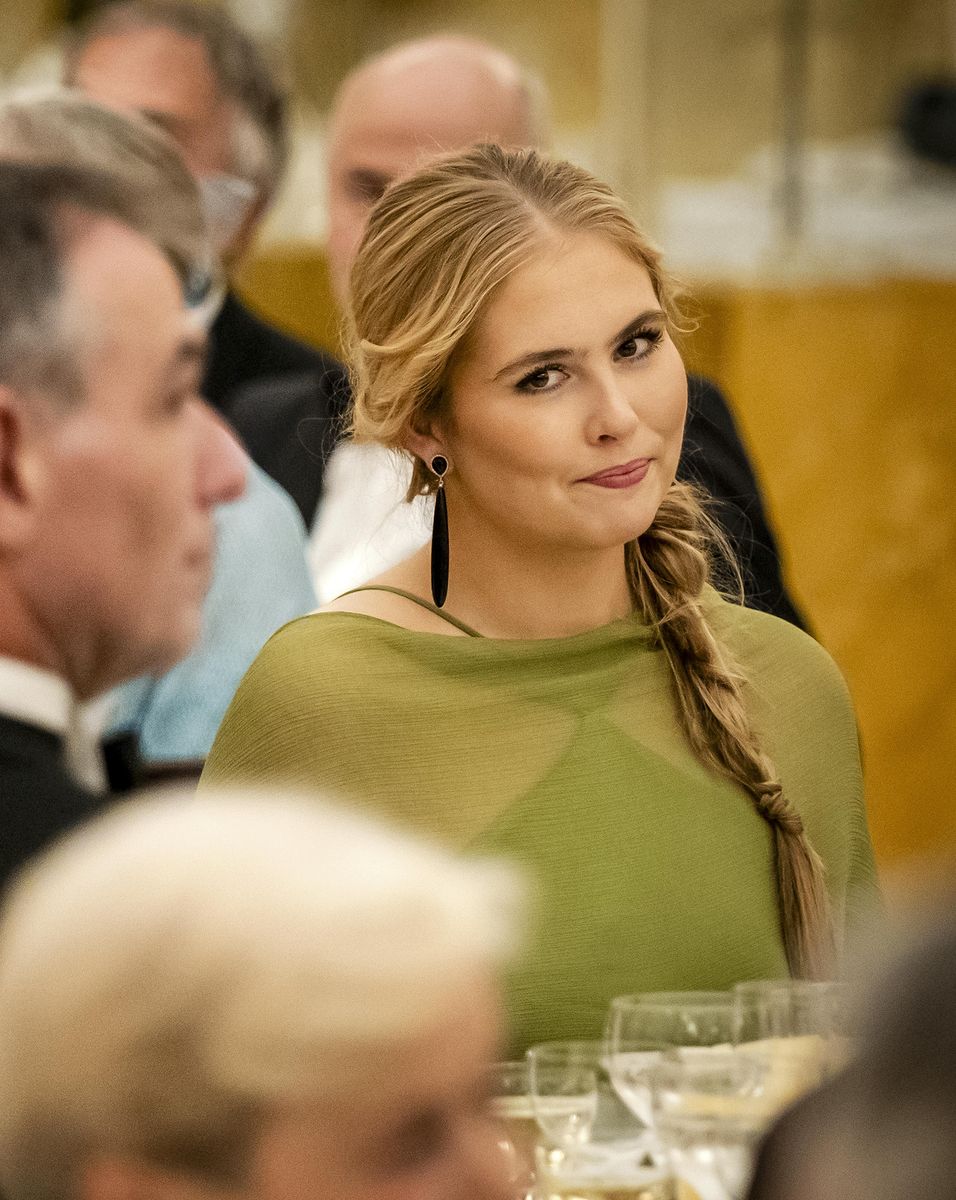 Princess Amalia completed her glamorous look with a romantic side braid, soft makeup and statement black earrings.