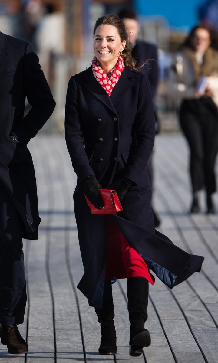 Kate looked Valentine's Day ready in a heart print scarf and red dress