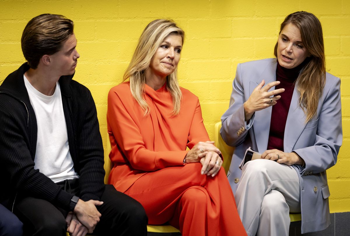 Queen Máxima moved by soccer players’ emotional stories during colorful stadium appearance