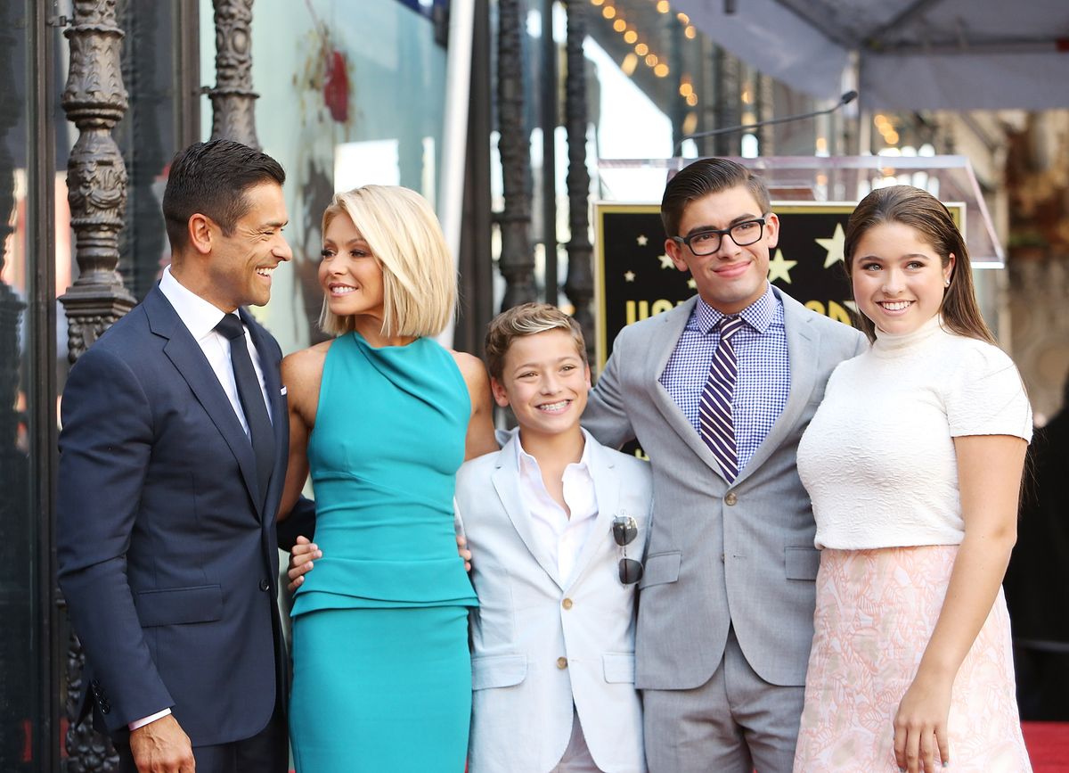 Kelly and Mark share three kids: Joaquin, Michael and Lola