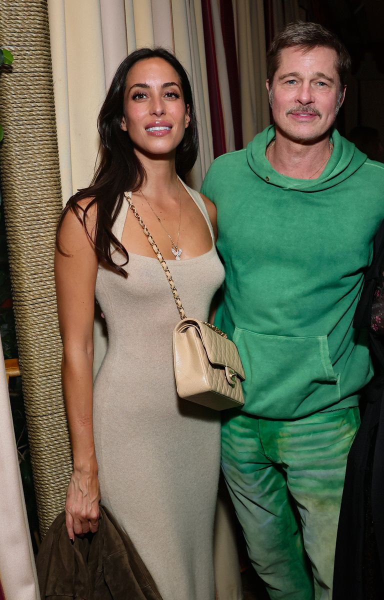 Brad Pitt debuts a bold new look while his girlfriend Inés de Ramón turns heads in a stylish figure-hugging dress