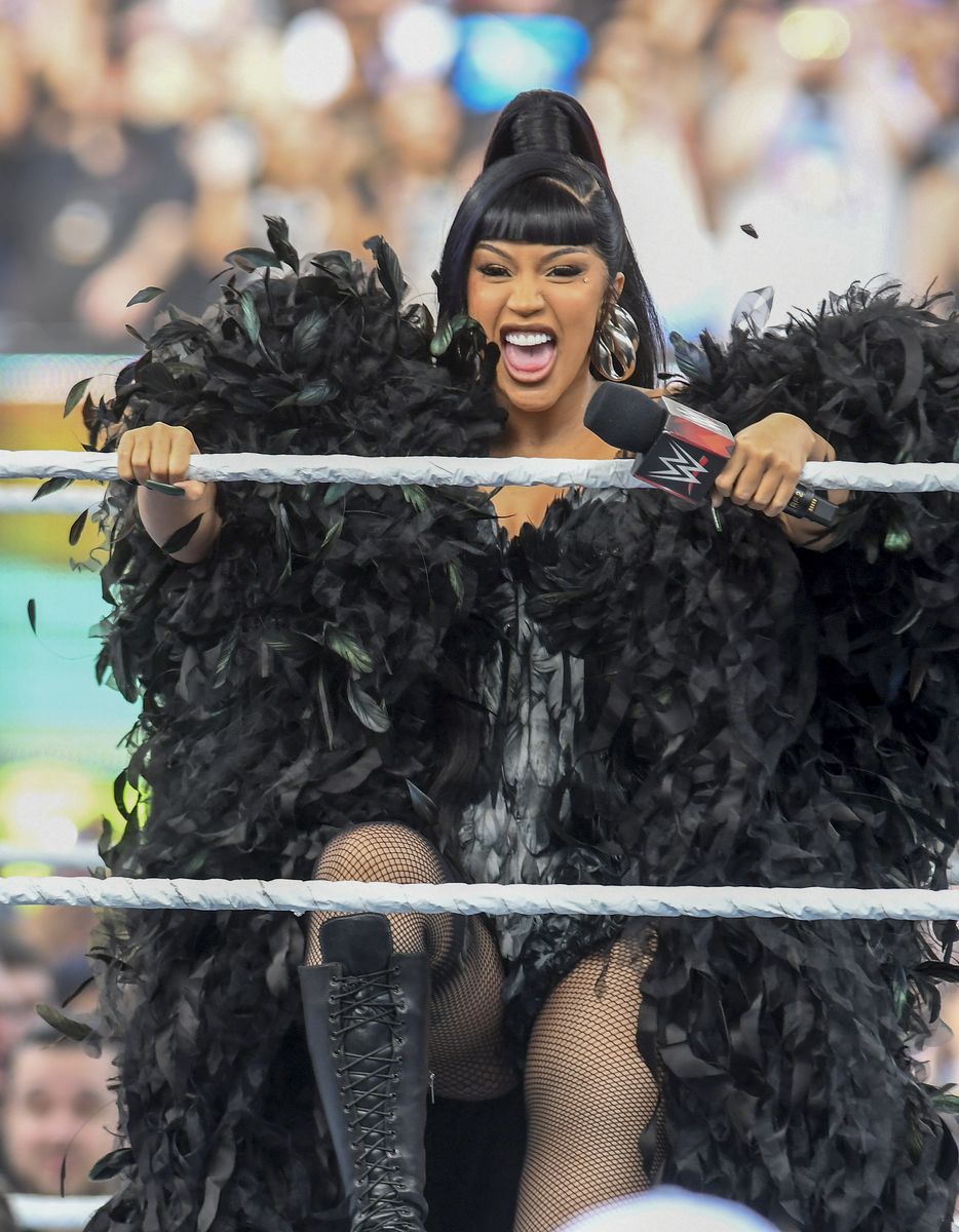  Her hair was styled in a sleek high ponytail.