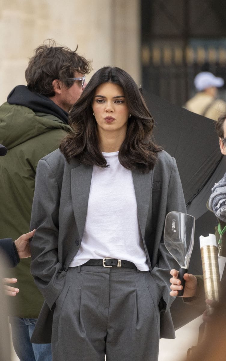 Kendall Jenner stuns in a gray suit while shooting a L’Oréal campaign in Paris