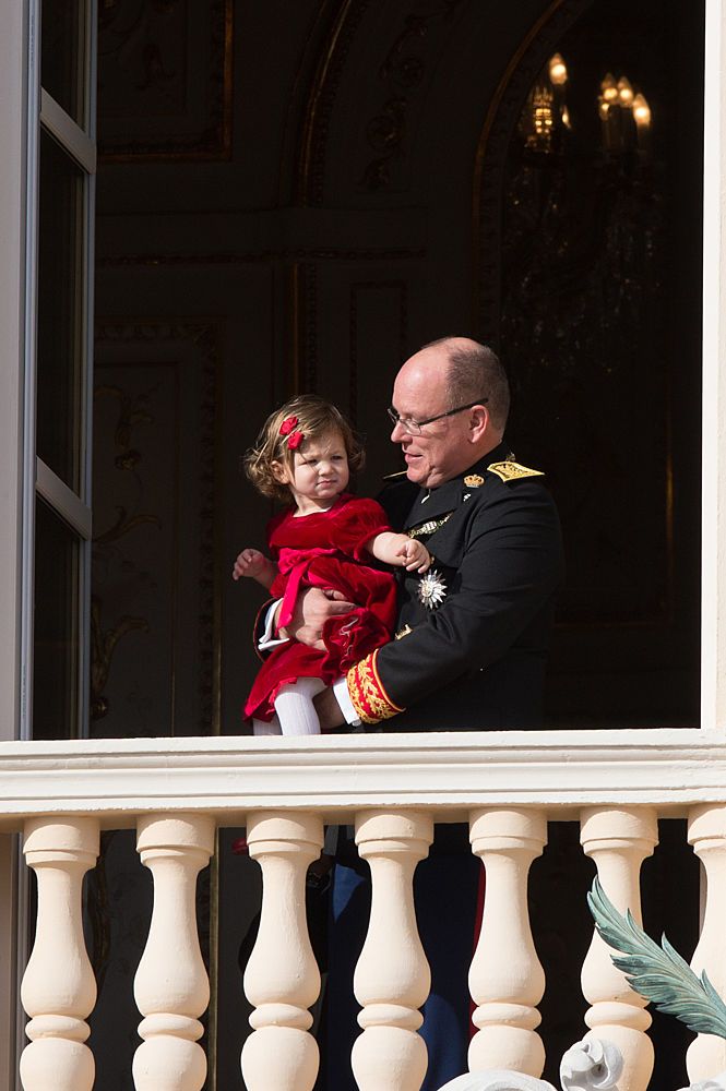 Prince Albert II of Monaco and India Casiraghi greet the crowd from the palace's balcony during the Monaco National Day Celebrations on November 19, 2016, in Monaco, Monaco.