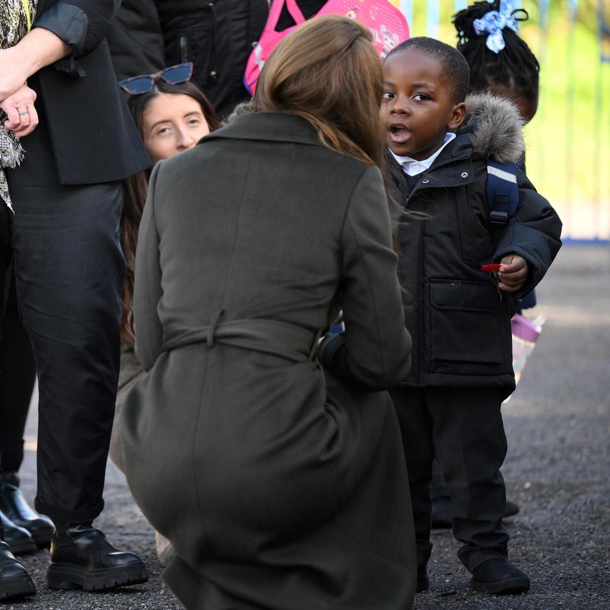 The royal mom of three shared a sweet moment with a little boy named Akeem. Catherine gave the three year old her Remembrance poppy.