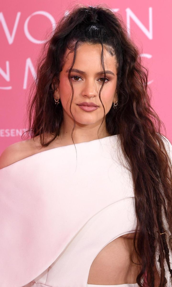 Rosalia with a high ponytail and two wisps of hair at the front