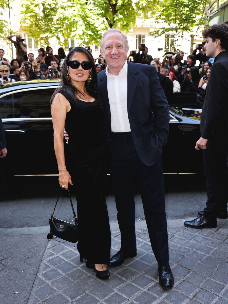 Salma Hayek with her husband François Henri-Pinault at Paris Fashion Week in coordinated looks
