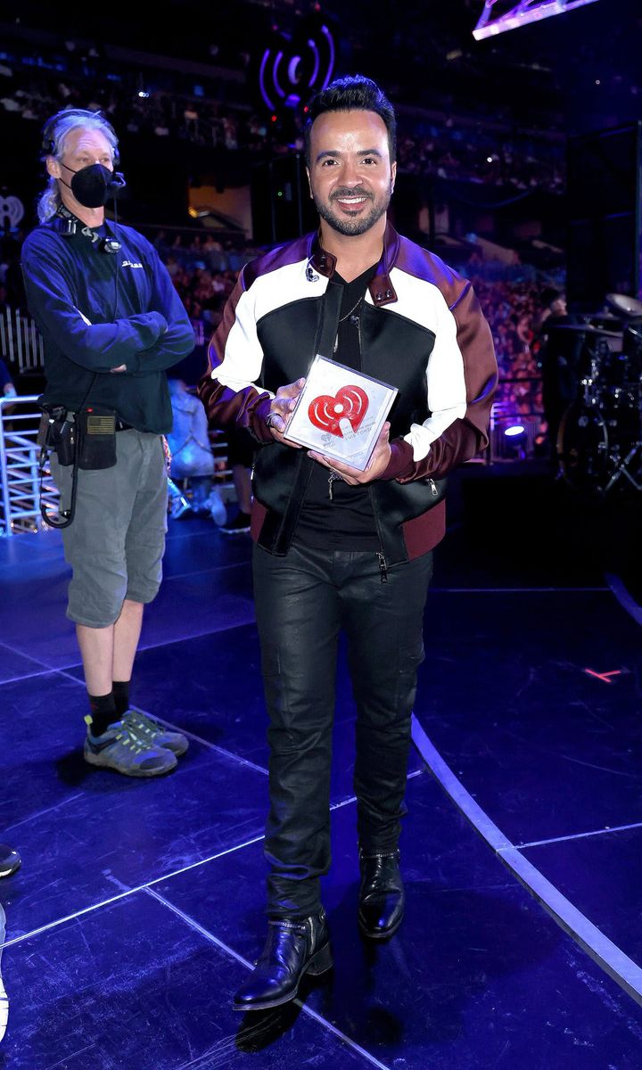 Luis Fonsi was the recipient of this year's iHeartRadio Corazon Latino Award, which honors an individual who exemplifies their big heart through their selfless work in enhancing the lives, heritage and future of the Latin community.