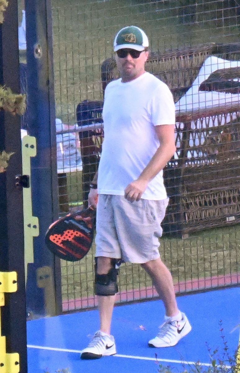 Leo was spotted looking cozy and joint safe with a knee brace