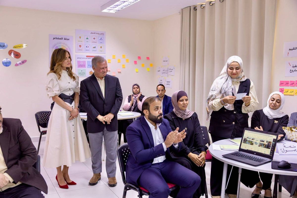 Queen Rania shared a warm moment with children during a kindergarten classroom visit alongside King Abdullah II.