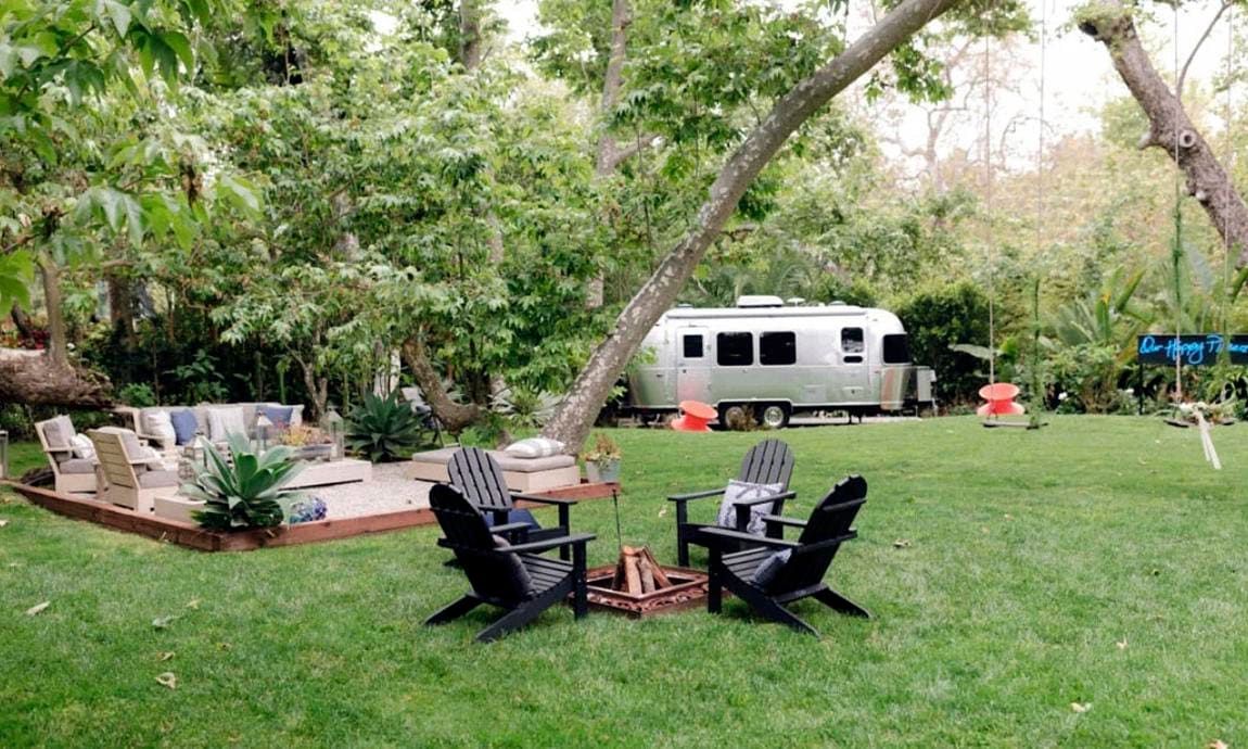 The outdoor patio of this multi-million home has a farm like feel to it.