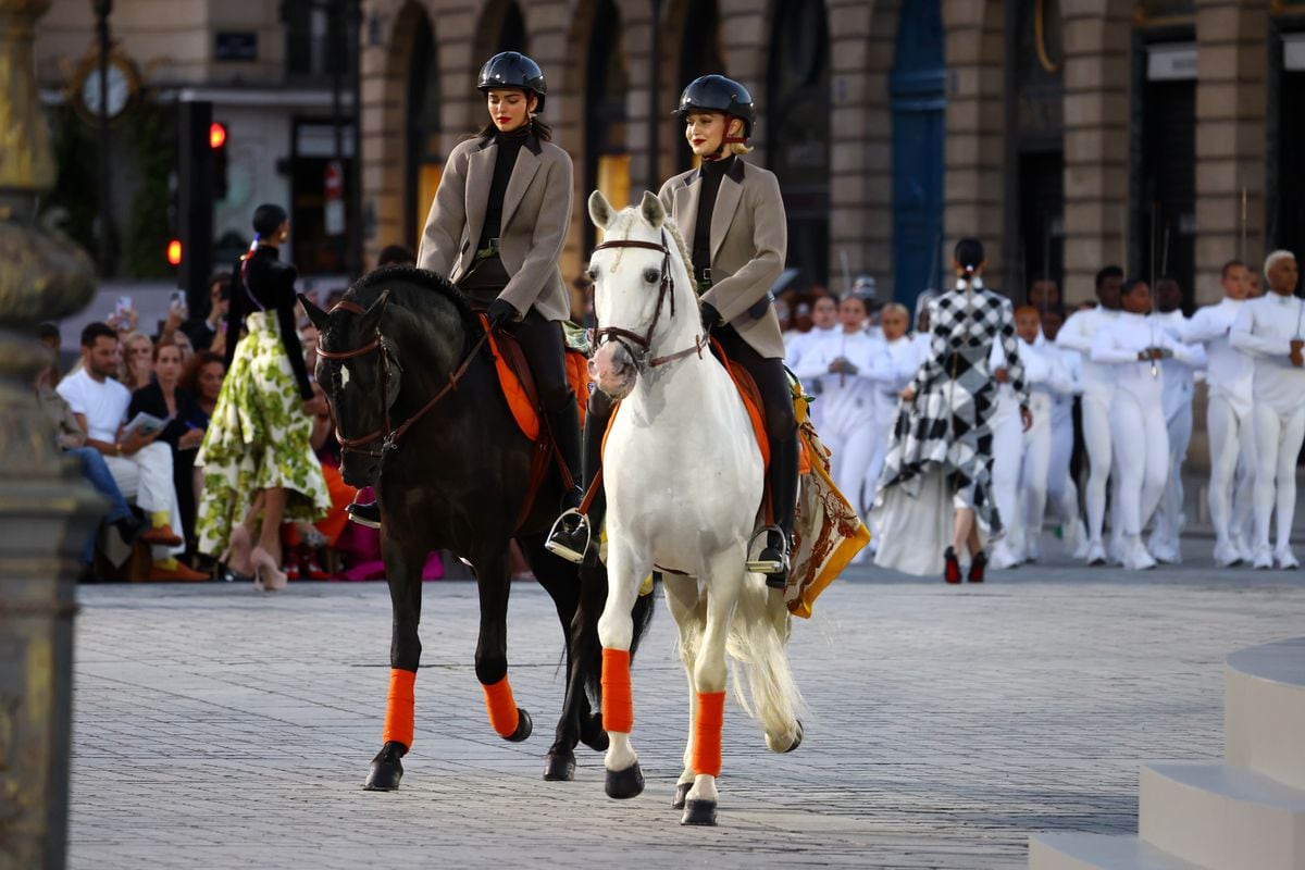 Kendall Jenner and Gigi Hadid ride horses on the runway during Vogue World: Paris at Place Vendome on June 23, 2024, in Paris, France. 