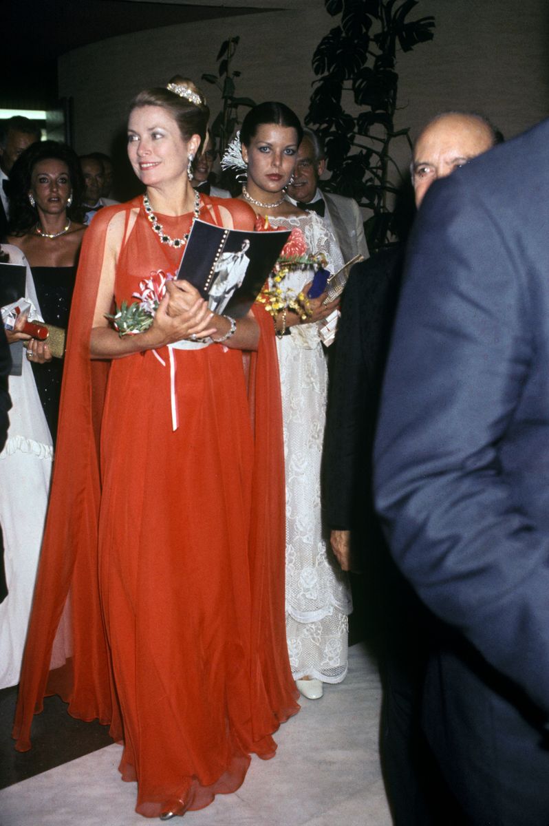 Princess Grace of Monaco and her daughter Princess Caroline arriving at the Red Cross Ball on August 6, 1976, in Monaco.