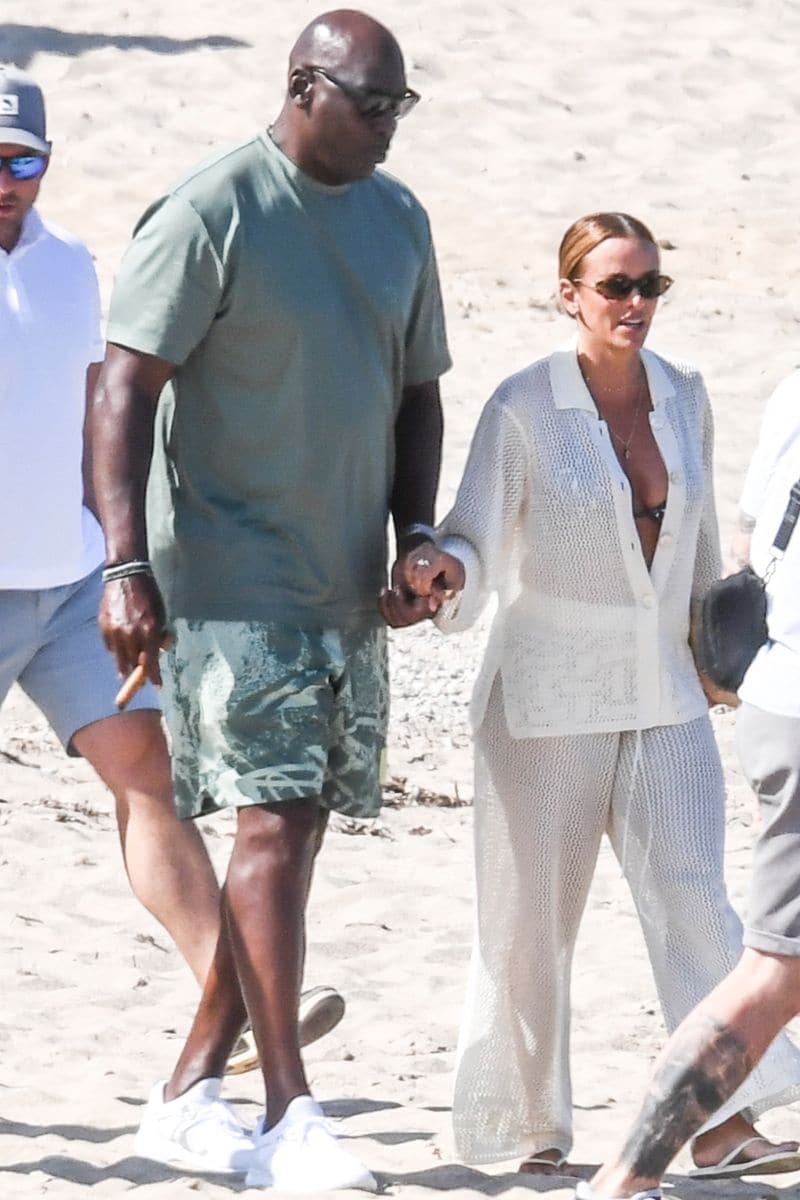 
Cigar in hand and style to spare, NBA legend Michael Jordan was spotted boarding a boat at Nikki Beach Porto Cervo with his stunning wife, Yvette Prieto. 