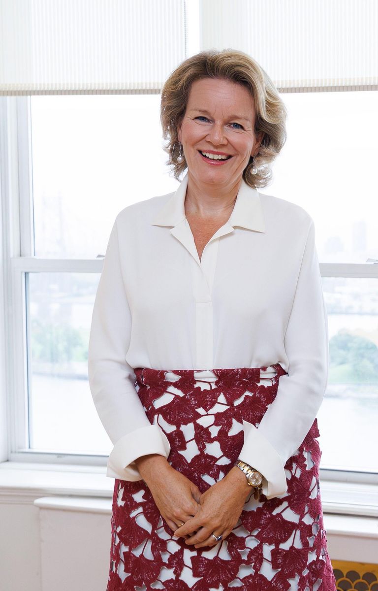 Queen Mathilde effortlessly balances classic royal dressing with modern fashion touches.