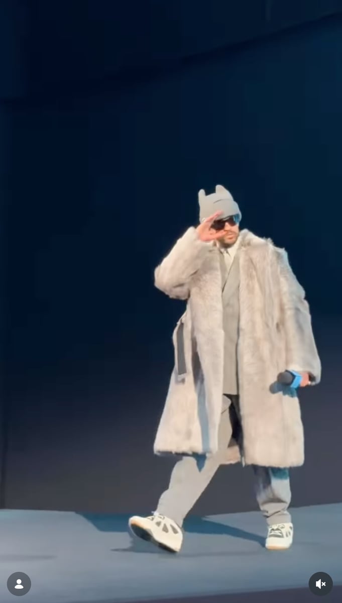 As he walked onto the stage, Bad Bunny greeted the room simply with, “Good morning!”, speaking in Spanish