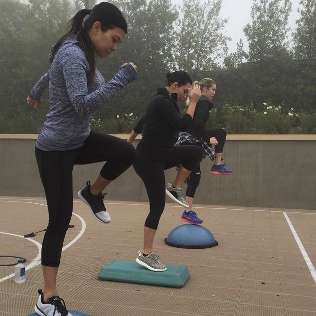 Kourtney Kardashian got some family bonding in by working out in the rain with her sisters Kim and Khloe in Michi's "Stardust" crop pant.
<br>
www.michiny.com
<br><br>
Photo: Instagram/ @kourtneykardash
