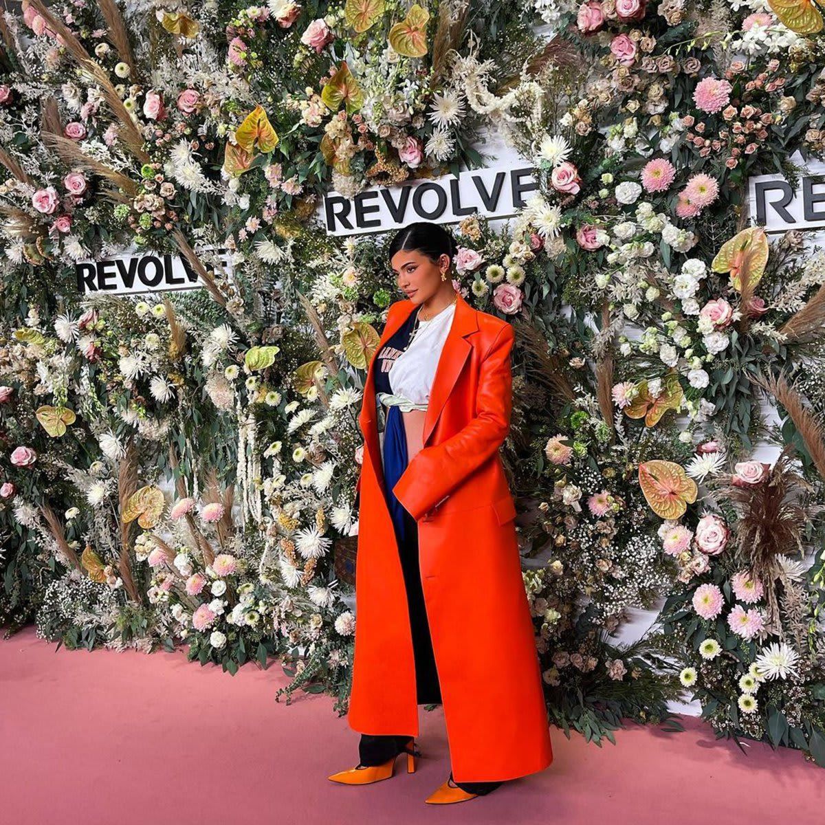 Kylie joined Revolve for New York Fashion week in September, and her peek a boo belly looked adorable on the pink carpet.