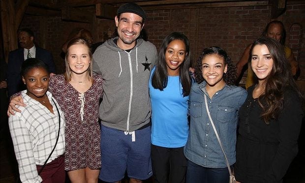 The US gymnastics team (Left to right: Simone Biles, Madison Kocian, Gabby Douglas, Laurie Hernandez, Aly Raisman) scored golden tickets to Broadway's <i>Hamilton</i> and met actor Javier Munoz.
<br>
Photo: Walter McBride/Getty Images