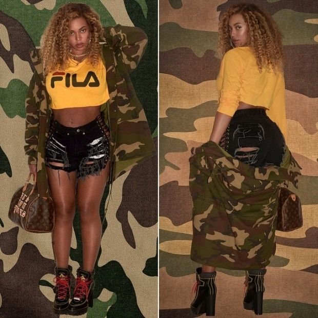 Queen Bey showed off her post-pregnancy body in a long-sleeved mustard yellow crop top by Fila and Coal 'N Terry high-waisted cut-off shorts with lace-up sides.
Photo: beyonce.com
