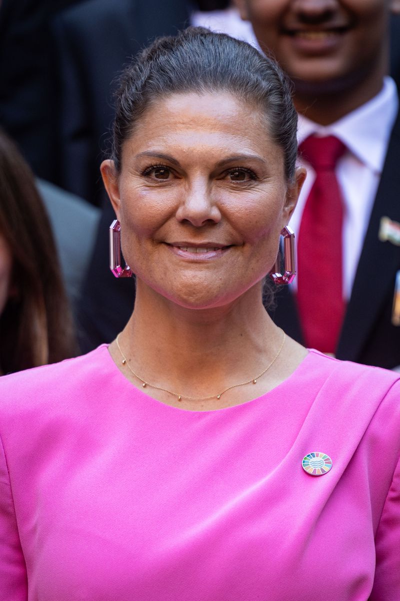 Crown Princess Victoria of Sweden's octagonal pink crystal earrings lit up her look and gave it a sophisticated sparkle.