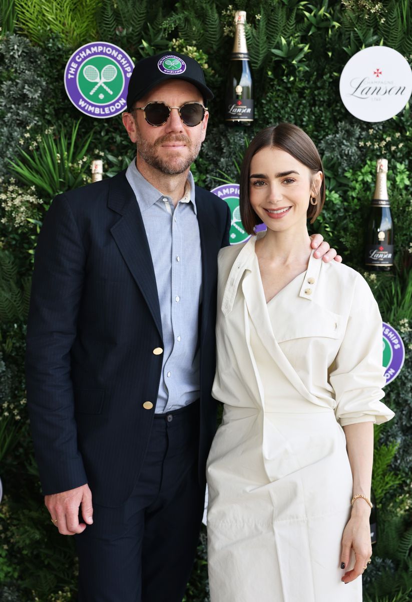 Charlie McDowell (L) and Lily Collins with Champagne Lanson at The Championships in Wimbledon at Agapanthus Suite on July 13, 2025 in Wimbledon, England. (Photo by Max Cisotti/Dave Benett/Getty Images for Champagne Lanson)