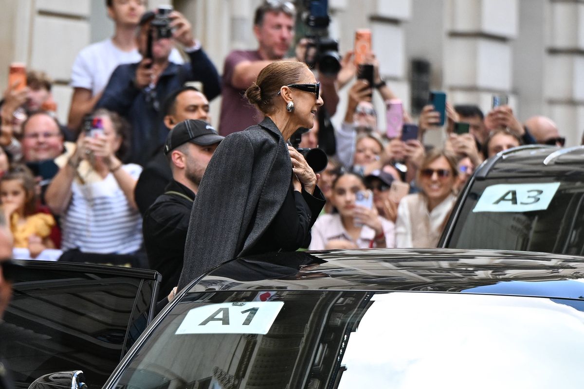 Céline appeared touched by the warm reception from fans as she departed the Royal Monceau ahead of her September 16 show.