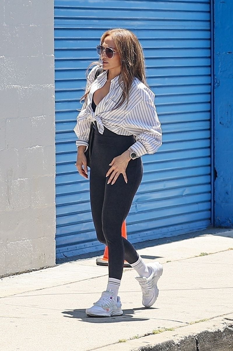 JLo elevated her relaxed outfit with the hard-to-find designer sneakers and gold jewelry