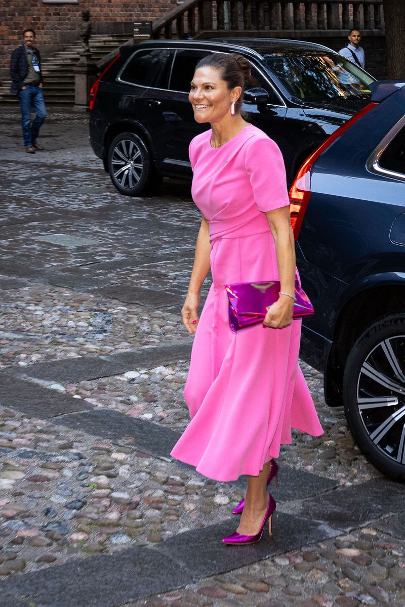 As is typical of her polished style, Victoria wore her hair in a tight, elegant bun.