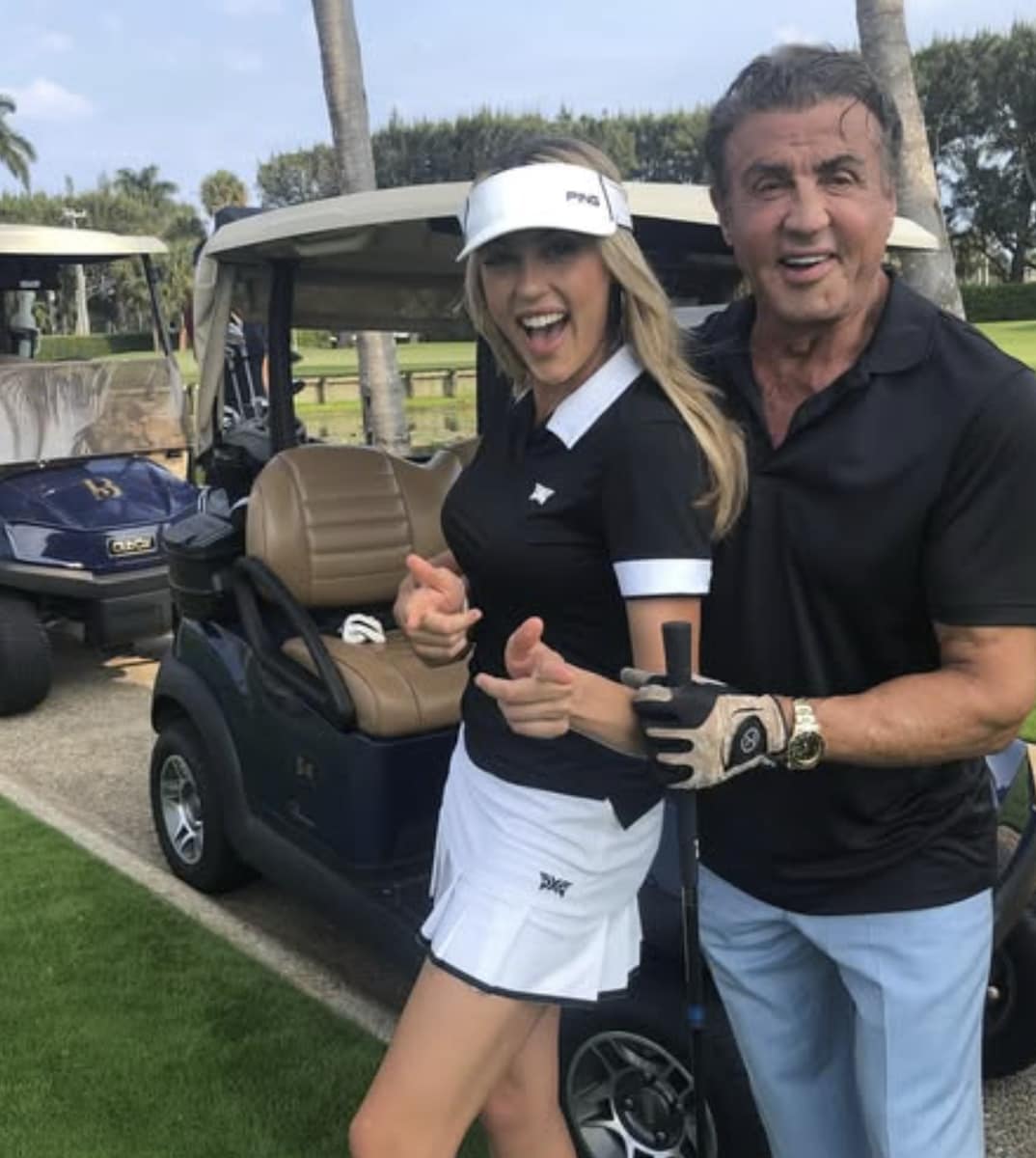 Sylverster and Sophia playing golf together