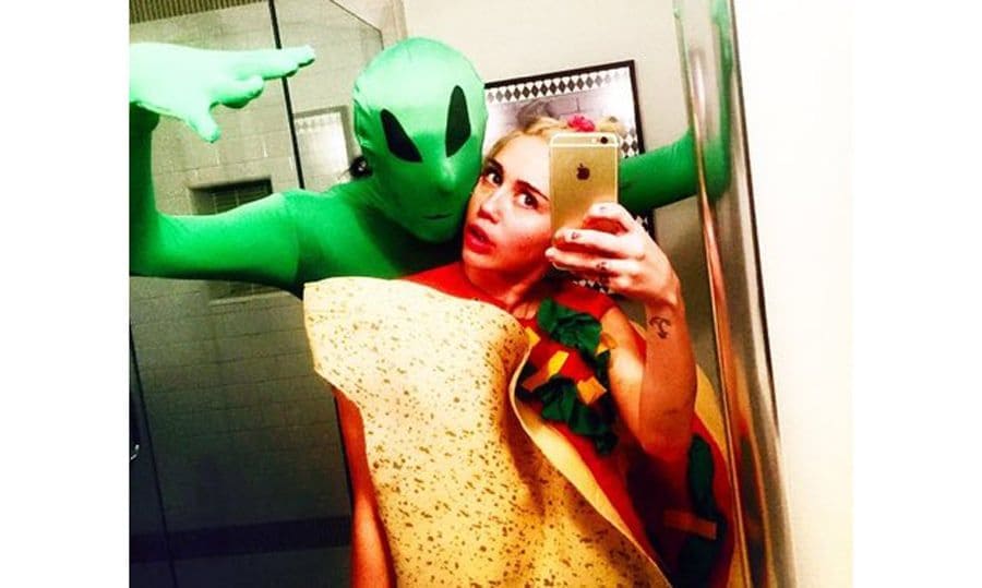Miley Cyrus gets in on Area 51 craze dressed as an alien with Selena Gomez