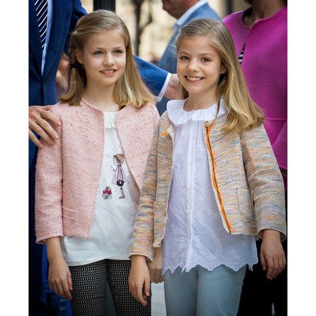 Spain's first in line, Princess Leonor, left, wore a jacket by Pili Carrera during an Easter 2016 event with sister Princess Sofia.
Photo: Getty Images