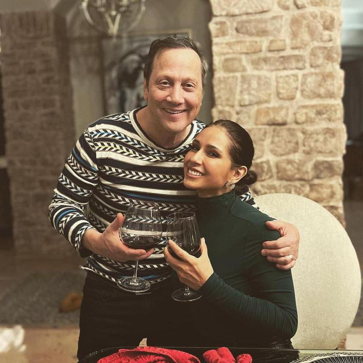 Rob Schneider and his wife, Paty