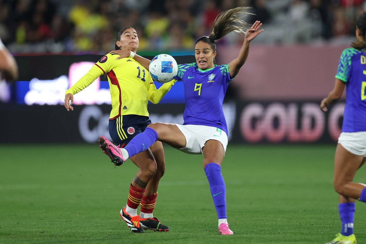 Gabi Nunes of Brazil battles Maria Usme #11 of Colombia for a loose ball during the first half of a Group B - 2024 Concacaf W Gold Cup game at Snapdragon Stadium on February 24, 2024 in San Diego, California. (Photo by Sean M. Haffey/Getty Images)