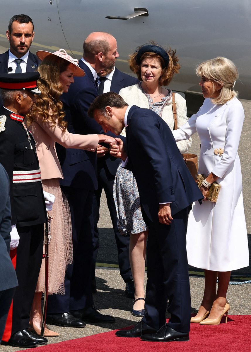 Prince William and Princess Kate welcome President Emmanuel Macron and his wife Brigitte upon arrival at RAF Northolt on July 8, 2025, at the start of a three-day state visit to Britain.