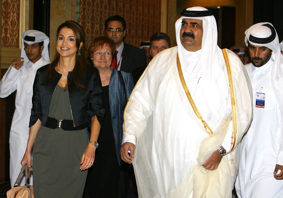 Queen Rania walks alongside then-Emir Sheikh Hamad bin Khalifa Al Thani during the Doha Forum in Qatar in 2010. The Jordanian Queen recently returned to Doha to pay her respects following his death.