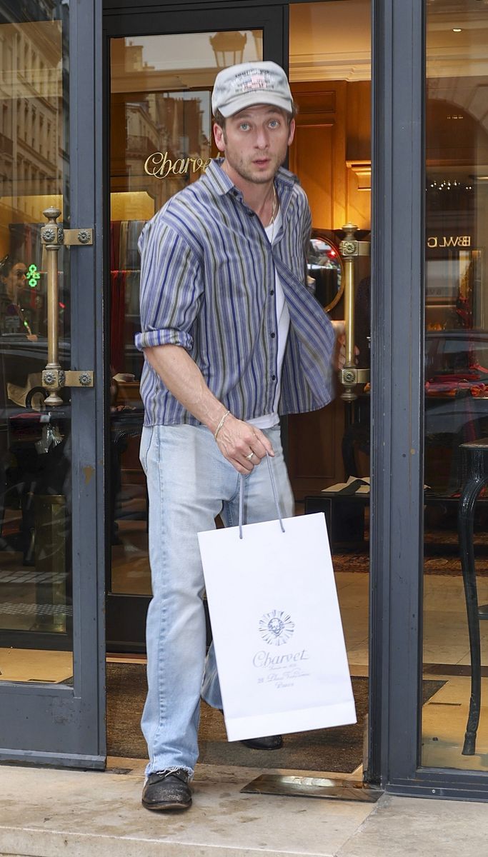 Jeremy Allen White leaves Charvet in Paris after a shopping trip on September 30, moments after Rosalía walked past the store.