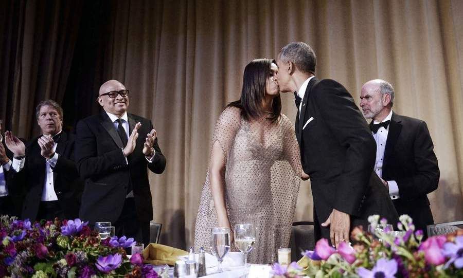 Mr and Mrs Obama shared a kiss during the dinner party.
<br>
Photo: Getty Images