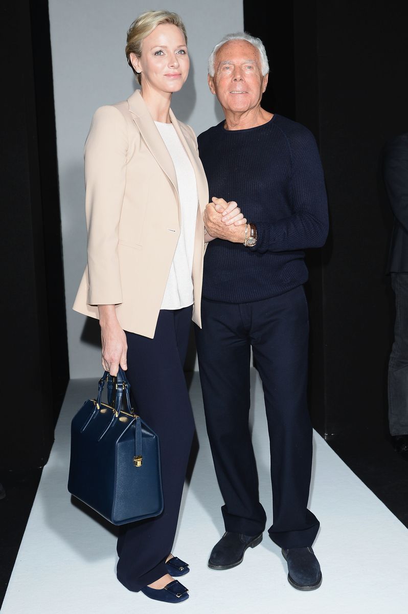 MILAN, ITALY - FEBRUARY 25:  Princess Charlene of Monaco and Giorgio Armani attend the Giorgio Armani fashion show during Milan Fashion Week Womenswear Fall/Winter 2013/14 on February 25, 2013 in Milan, Italy.  (Photo by Venturelli/WireImage)