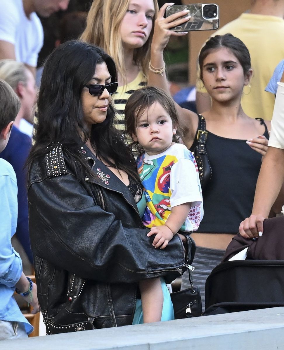 Kourtney Kardashian, daughter Penelope, and her baby Rocky Thirteen were spotted enjoying a family stroll through the charming streets of Portofino.