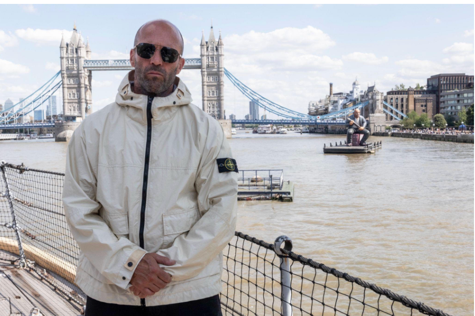 Statham alongside his inflatable double in London