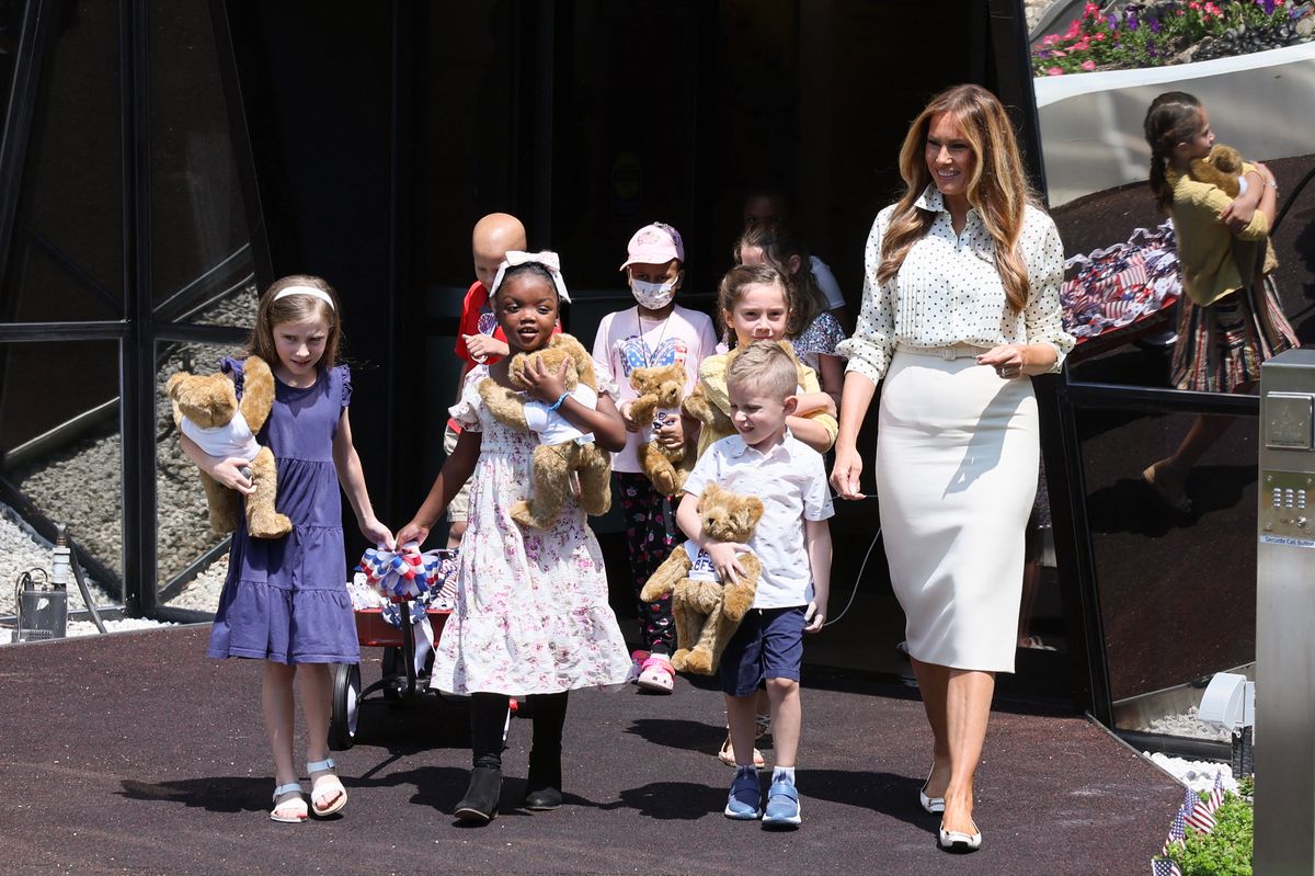 Melania Trump takes part in an activity with children during a visit at Children's National Hospital 